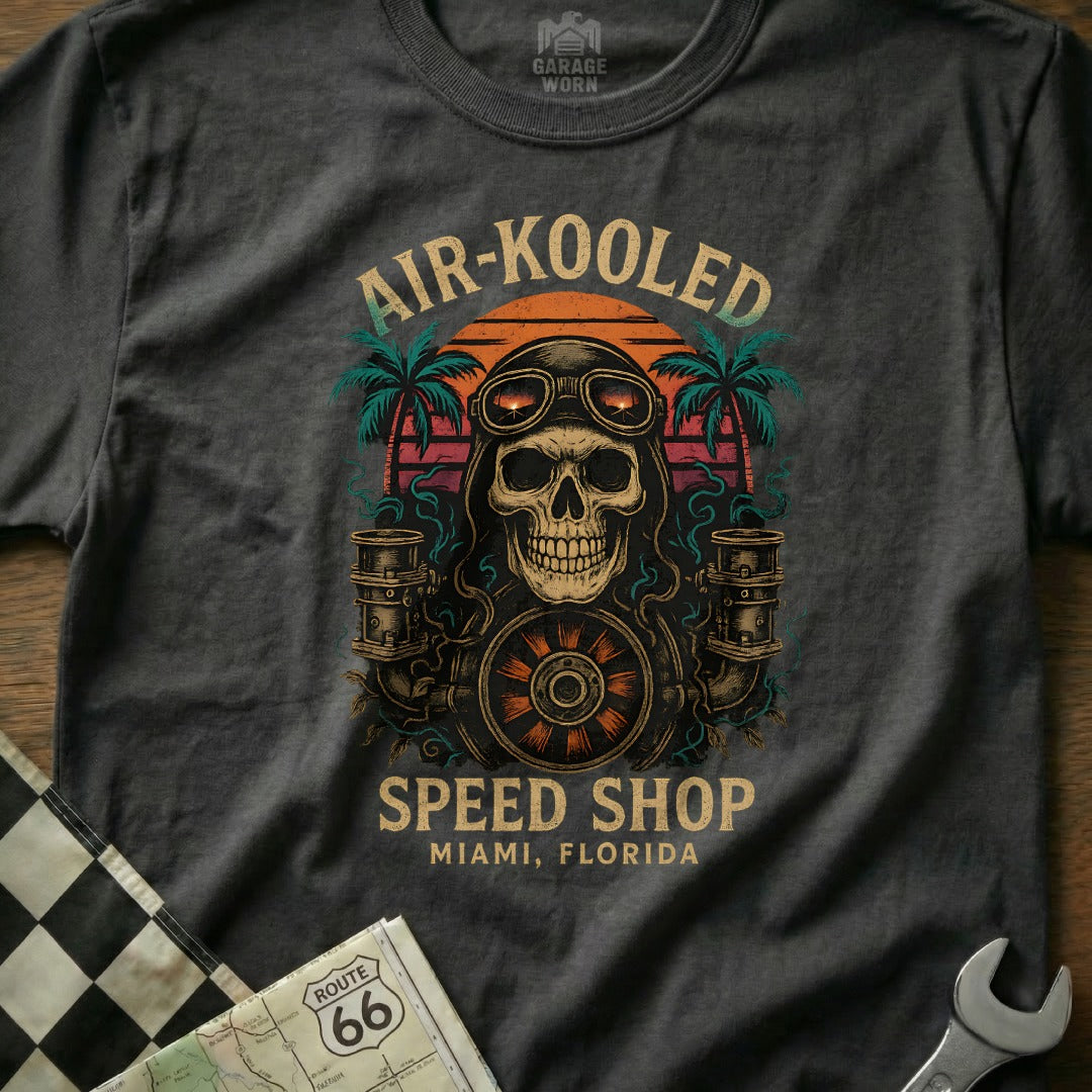 T-shirt with skull, goggles, palm trees, and "Air-Kooled Speed Shop Miami, Florida" text.
