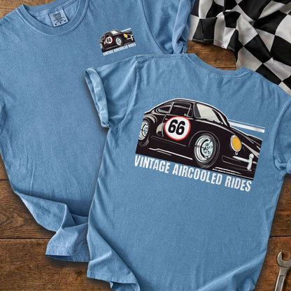 Blue t-shirt with graphic of black vintage car, number 66, and text "VINTAGE AIRCOOLED RIDES".
