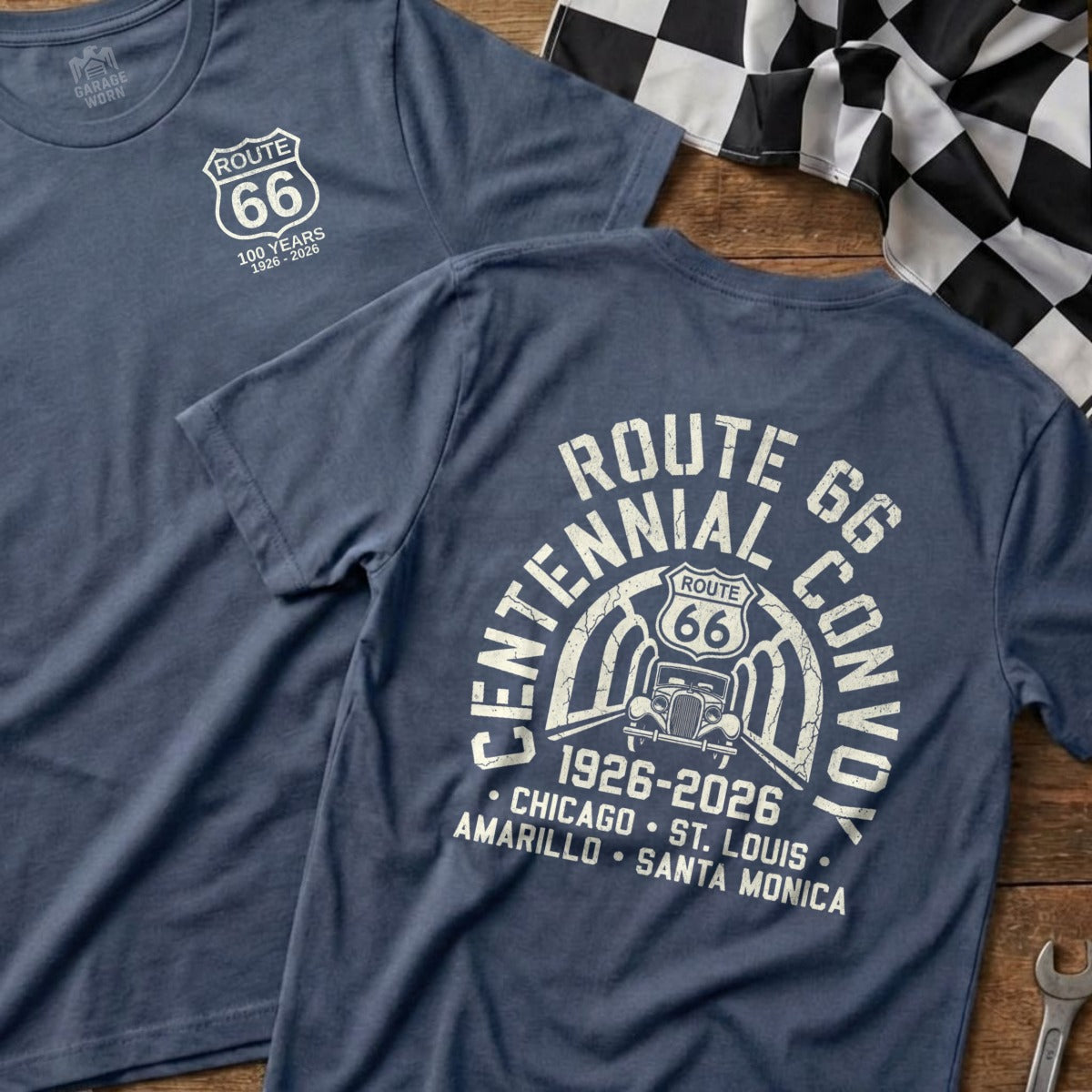 Two blue t-shirts with Route 66 centennial graphics and text.