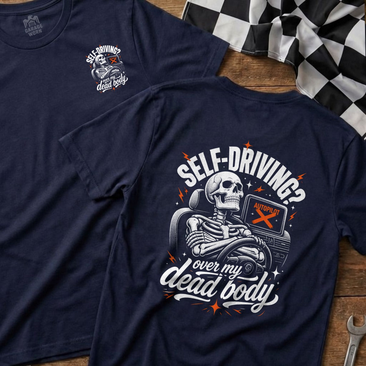 Navy t-shirt with skeleton driving, "Self-driving? Over my dead body" text.