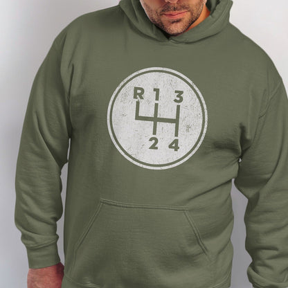 Green hoodie with a white distressed manual transmission shift pattern graphic.