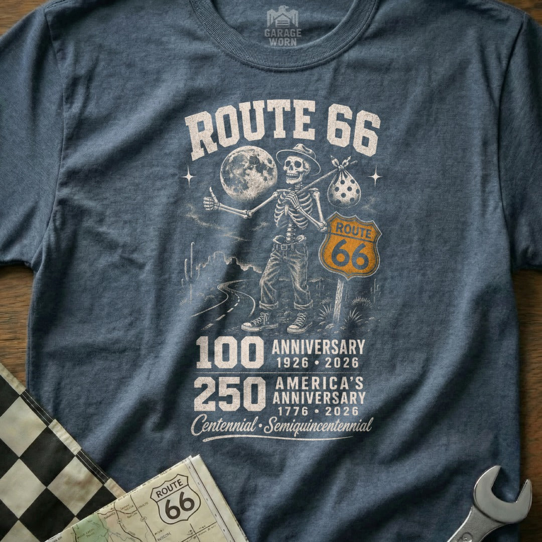 Route 66 skeleton traveler graphic with anniversary dates on a blue t-shirt.