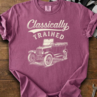 Vintage car graphic with text "Classically TRAINED" on a maroon t-shirt.