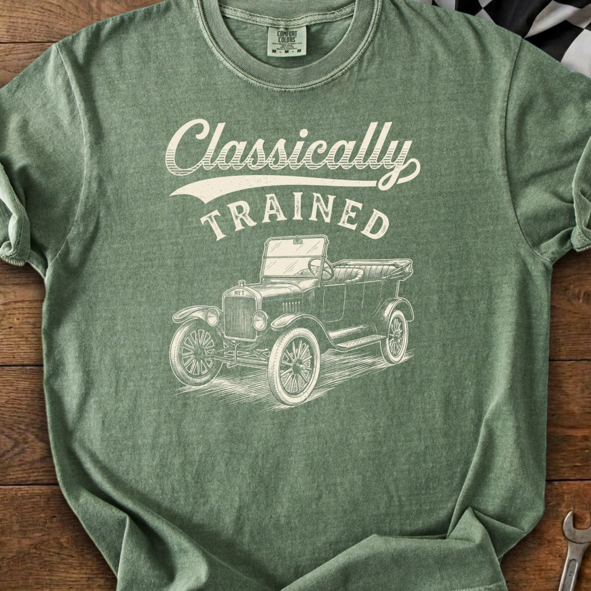 Green t-shirt with "Classically TRAINED" text and a vintage automobile illustration.