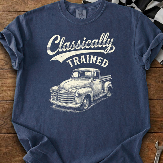 Navy t-shirt with "Classically TRAINED" text and a vintage truck graphic.