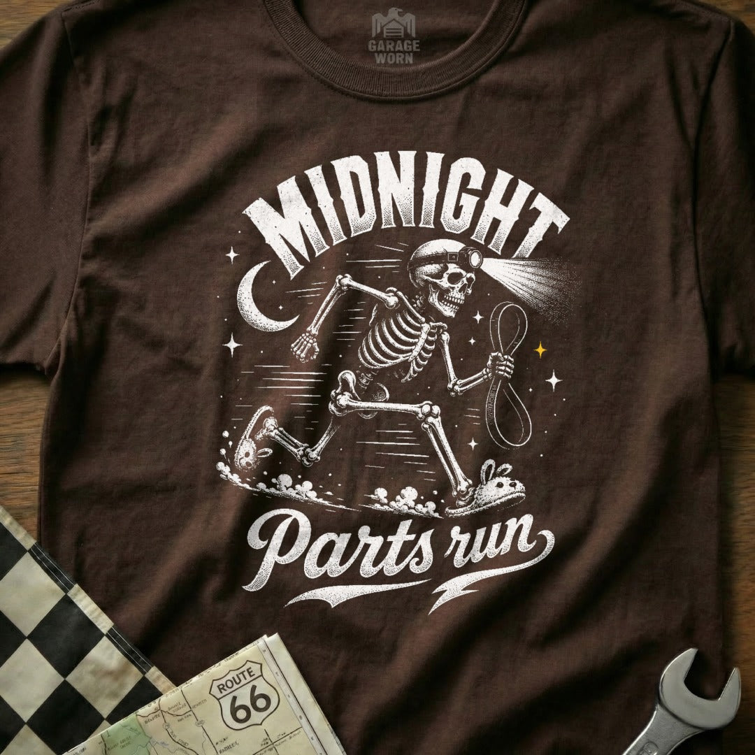 T-shirt with skeleton running in the dark and "Midnight Parts Run" text.