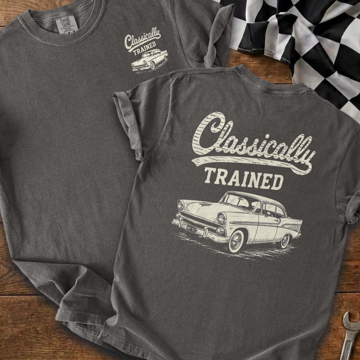 Dark gray t-shirt with white text "Classically TRAINED" and vintage car graphic.
