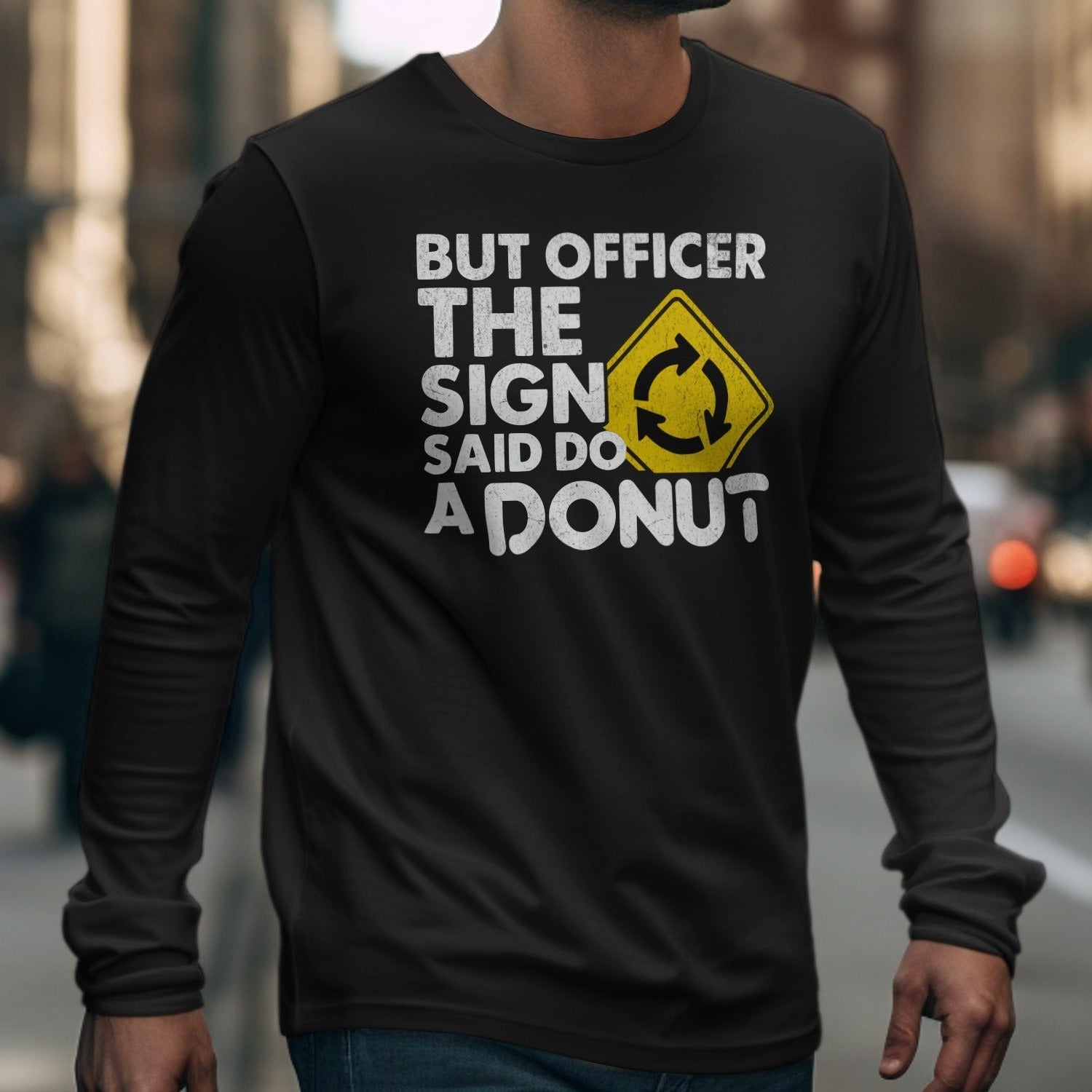 Black long sleeve shirt with text "But officer the sign said do a donut".