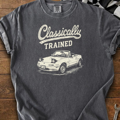 T-shirt with white graphic of a convertible car and text "Classically TRAINED".