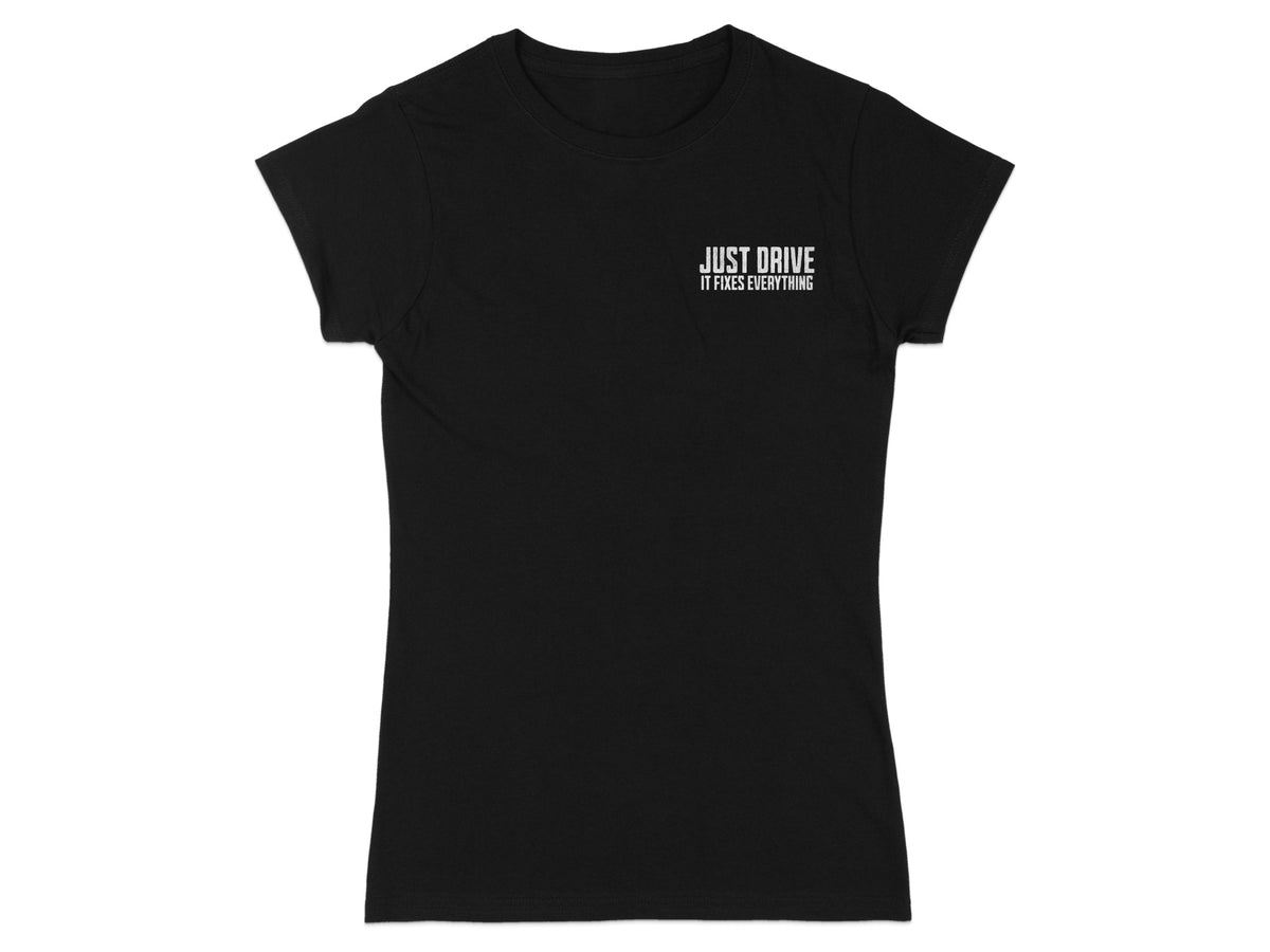 Black t-shirt with "JUST DRIVE IT FIXES EVERYTHING" printed on the left chest.