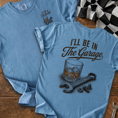 Light blue t-shirt with "