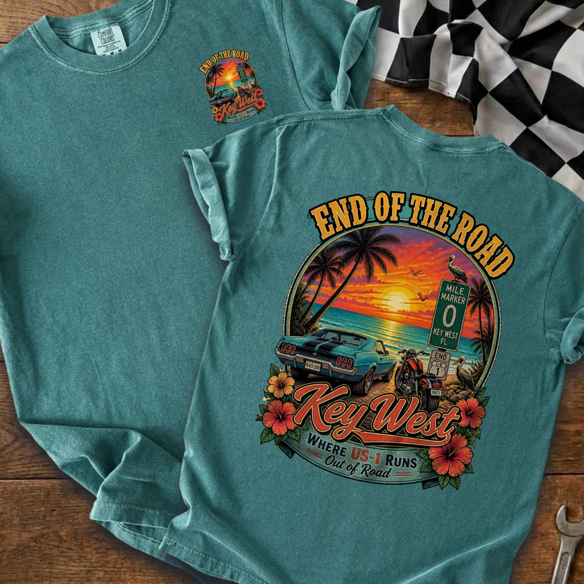 Teal t-shirt featuring "End of the Road Key West" graphic with car and motorcycle.