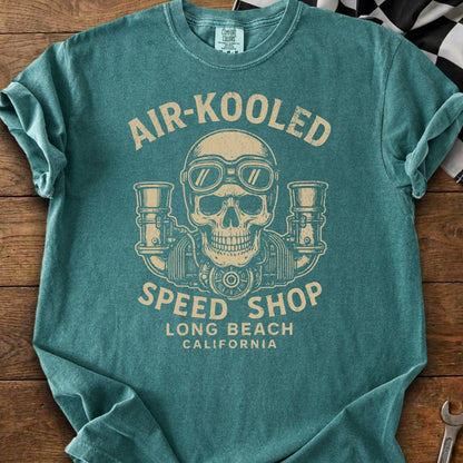 Teal t-shirt with vintage skull, goggles, and engines graphic.