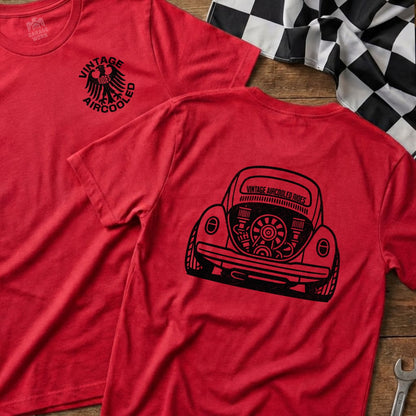 Red t-shirt with vintage air-cooled engine graphic on back, checkered flag behind.