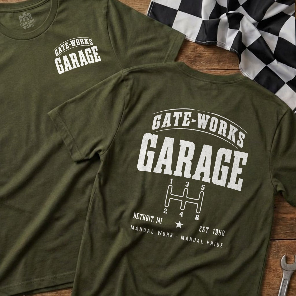 Olive green t-shirt with "GATE-WORKS GARAGE" and a manual transmission shift pattern.