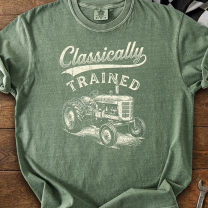 Green t-shirt with text "Classically TRAINED" and a vintage tractor graphic.