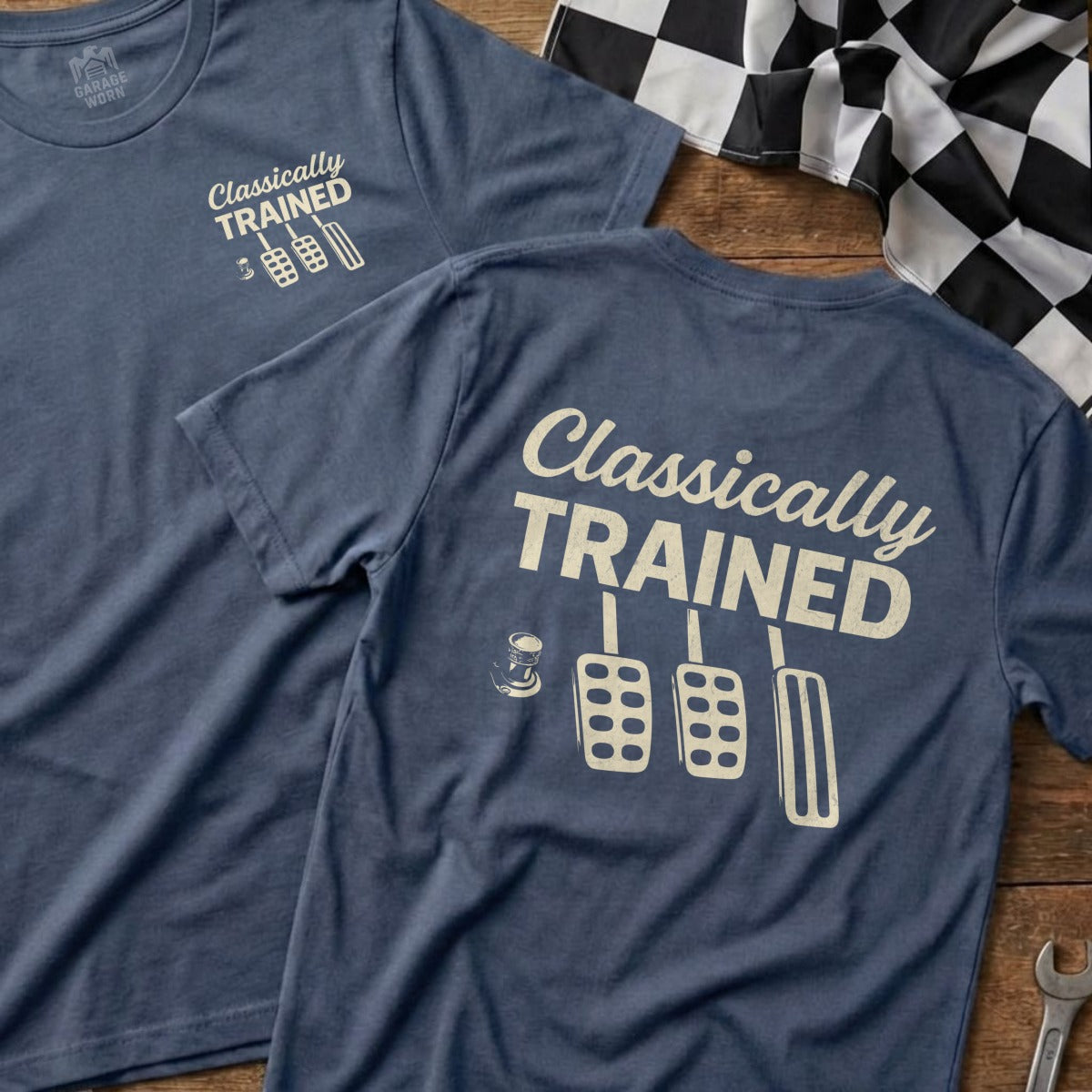 Blue t-shirt with "Classically Trained" and pedal graphics on the back.
