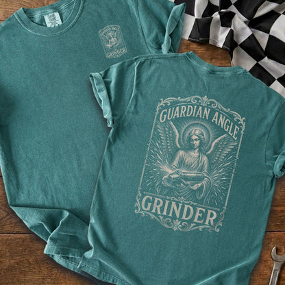 Teal t-shirt with Guardian Angle Grinder graphic on back, small graphic on front.