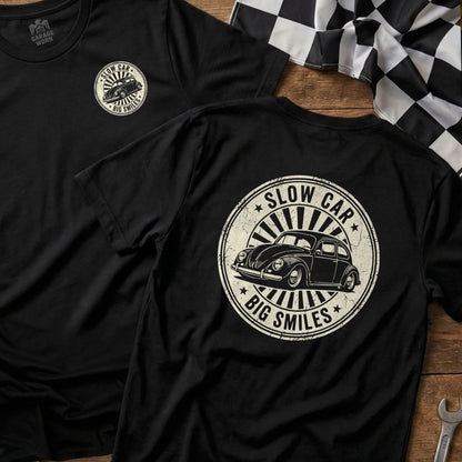 Black t-shirt with circular graphic "Slow Car, Big Smiles" and vintage Beetle.