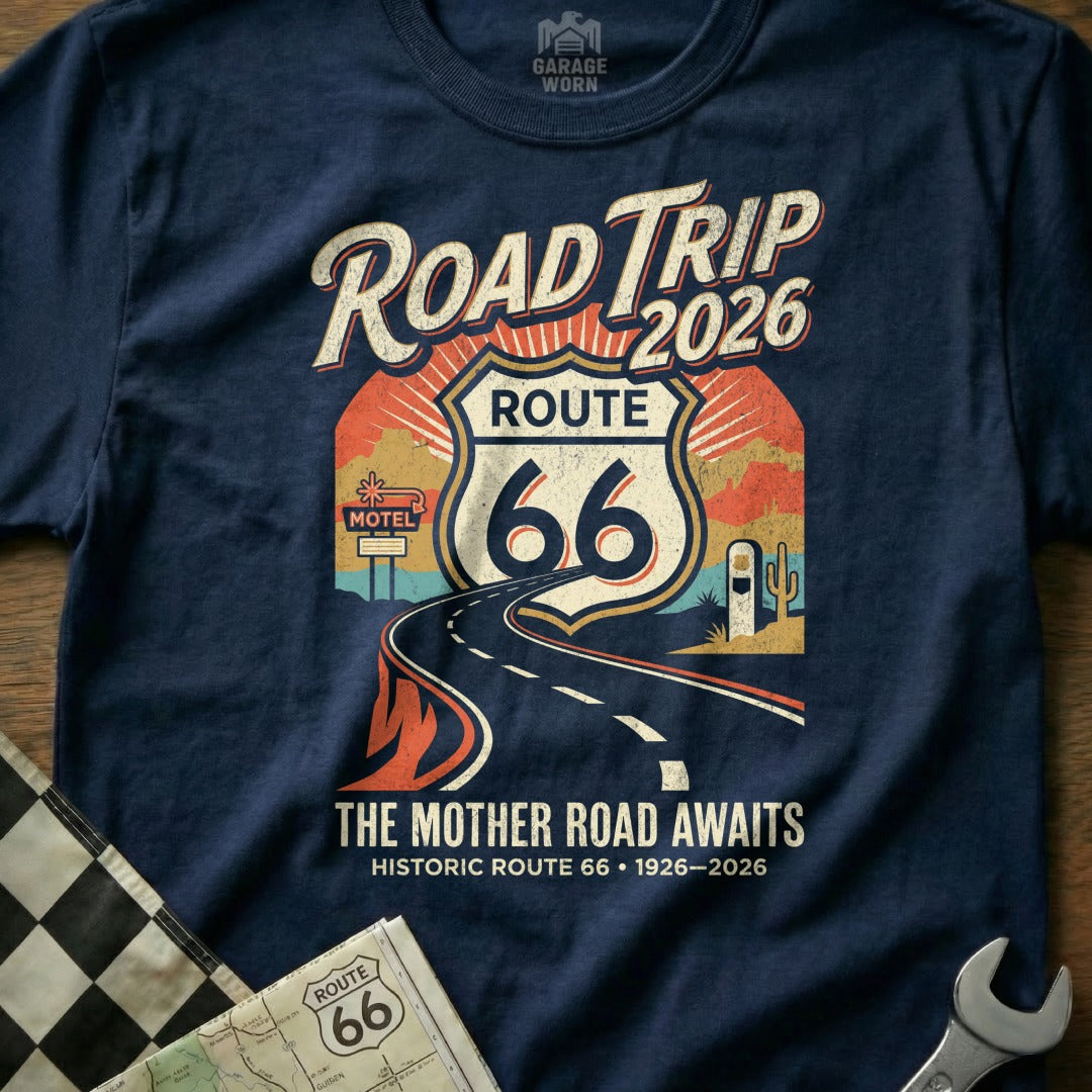 Navy t-shirt with Route 66 Road Trip 2026 graphic, "The Mother Road Awaits" text.