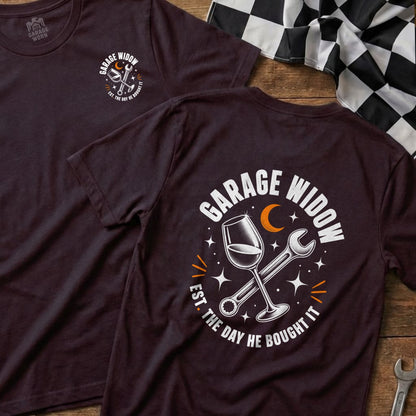T-shirt with "Garage Widow" text, wine glass, wrench, moon, and stars.