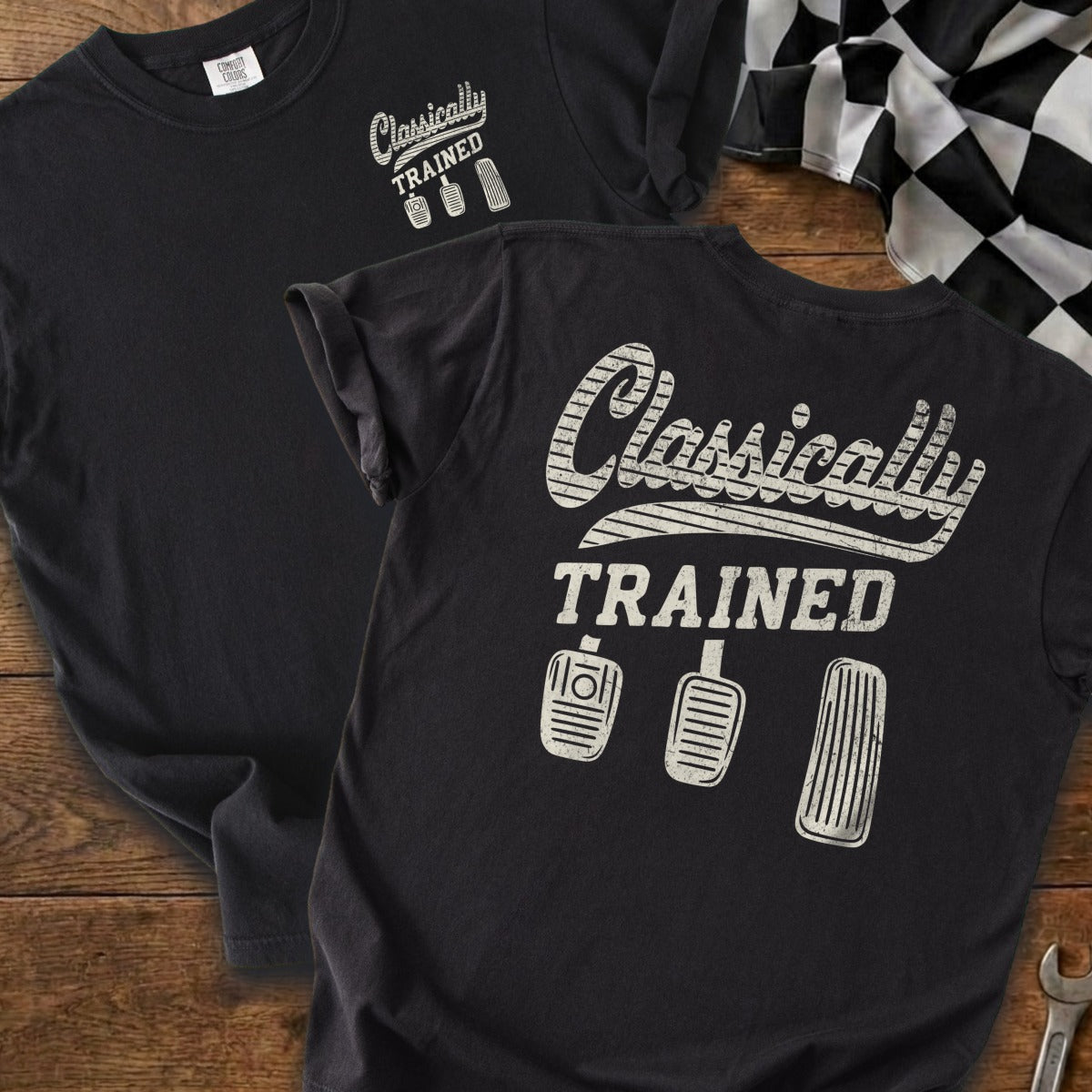 Black t-shirt with "Classically TRAINED" and three pedal graphics.