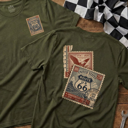 Two olive green t-shirts with Route 66 anniversary stamp designs.