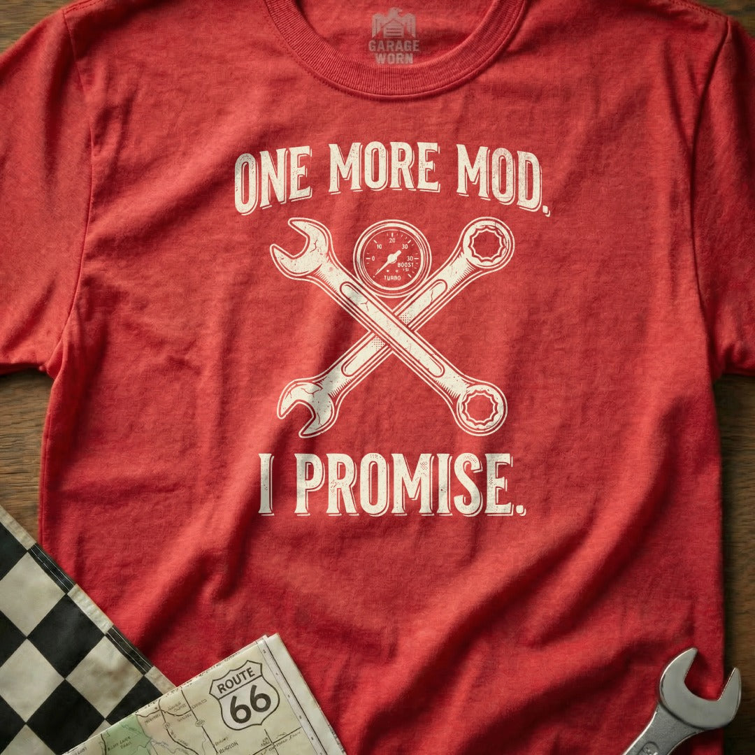 Red t-shirt with crossed wrenches, a gauge, and text "One More Mod, I Promise".