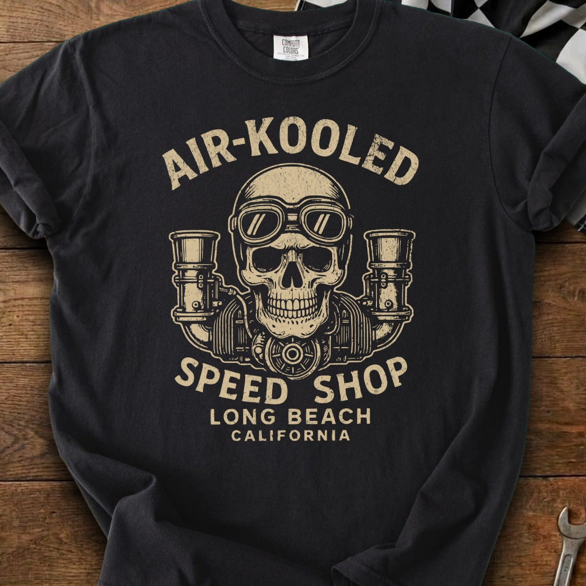 Black t-shirt with "AIR-KOOLD SPEED SHOP LONG BEACH CALIFORNIA" text and skull graphic.