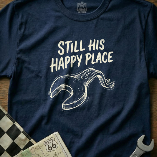 Navy t-shirt with "Still His Happy Place" and a wrench graphic.
