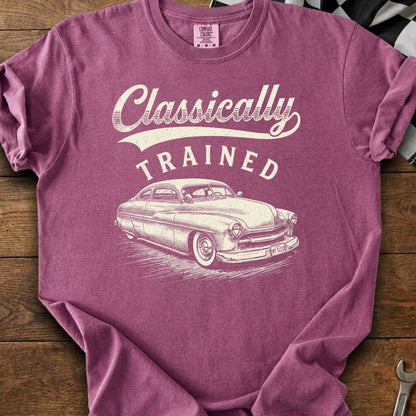 Maroon t-shirt with "Classically TRAINED" text and sketch of a vintage car.