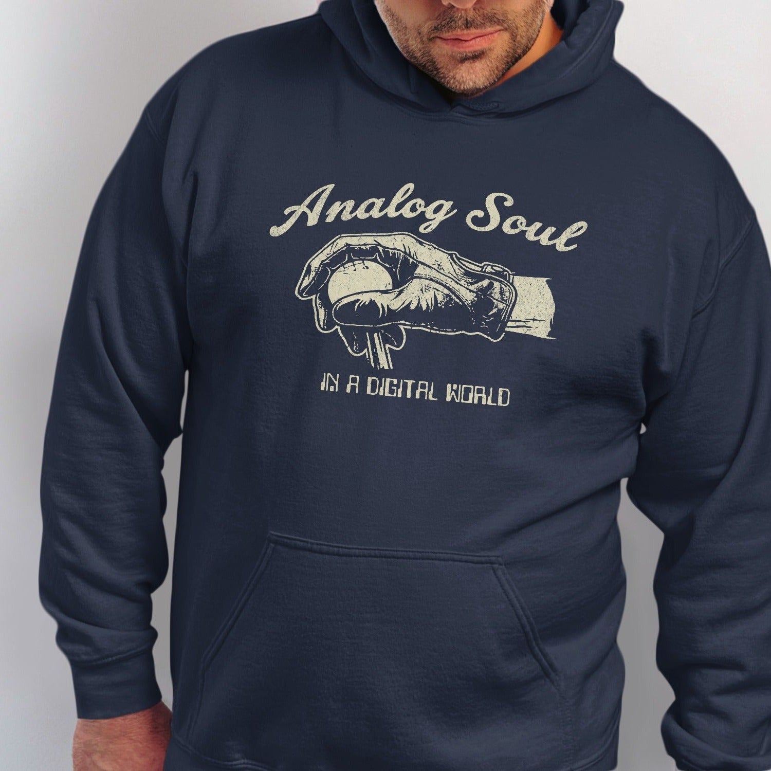 Navy hoodie with "Analog Soul In A Digital World" text and a hand in a glove holding a baseball.