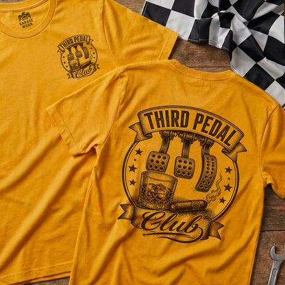 Gold t-shirt with "Third Pedal Club" logo: clutch, brake, accelerator, whiskey, and cigar.