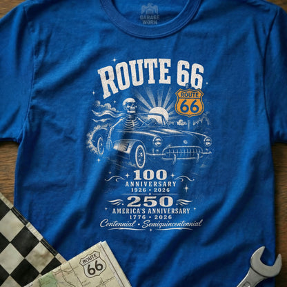 Blue t-shirt with Route 66 logo, skeleton driving a classic car, and anniversary dates.