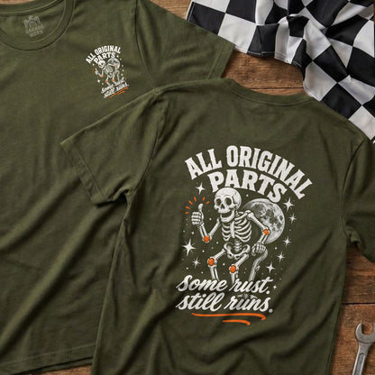 Green t-shirt with skeleton giving thumbs up, "All Original Parts, Some Rust Still Runs."
