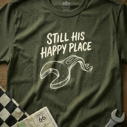 Green t-shirt with "Still His Happy Place" text and wrench graphic.