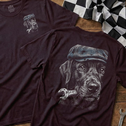 T-shirt with a black dog wearing a cap holding a wrench.