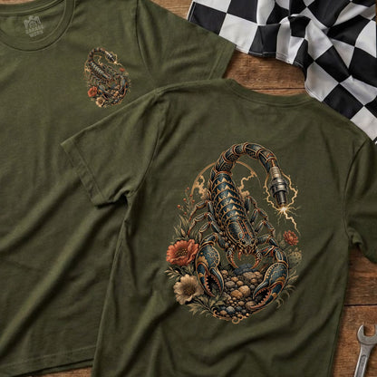 Scorpion graphic with spark plug detail on olive green t-shirt.