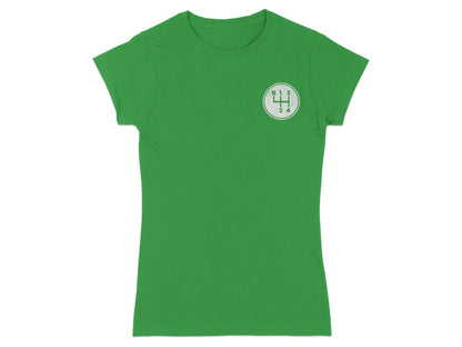 Green t-shirt with a white circular graphic of a car's manual gear shift pattern.