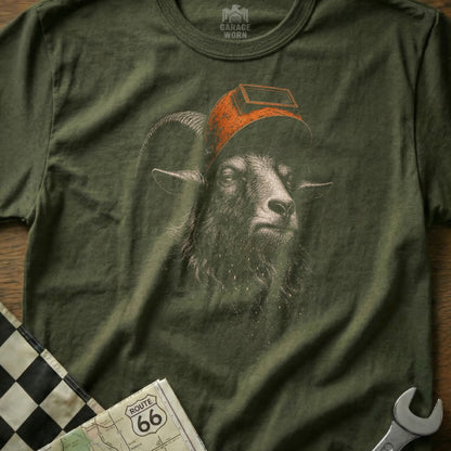 Olive green t-shirt with a black goat wearing a welding mask graphic.