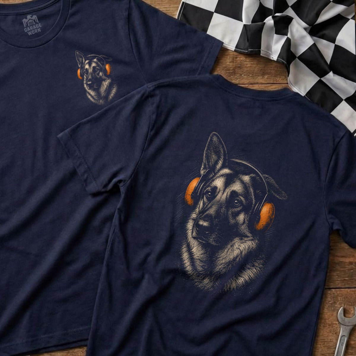 Navy t-shirt with a German Shepherd wearing orange headphones graphic.