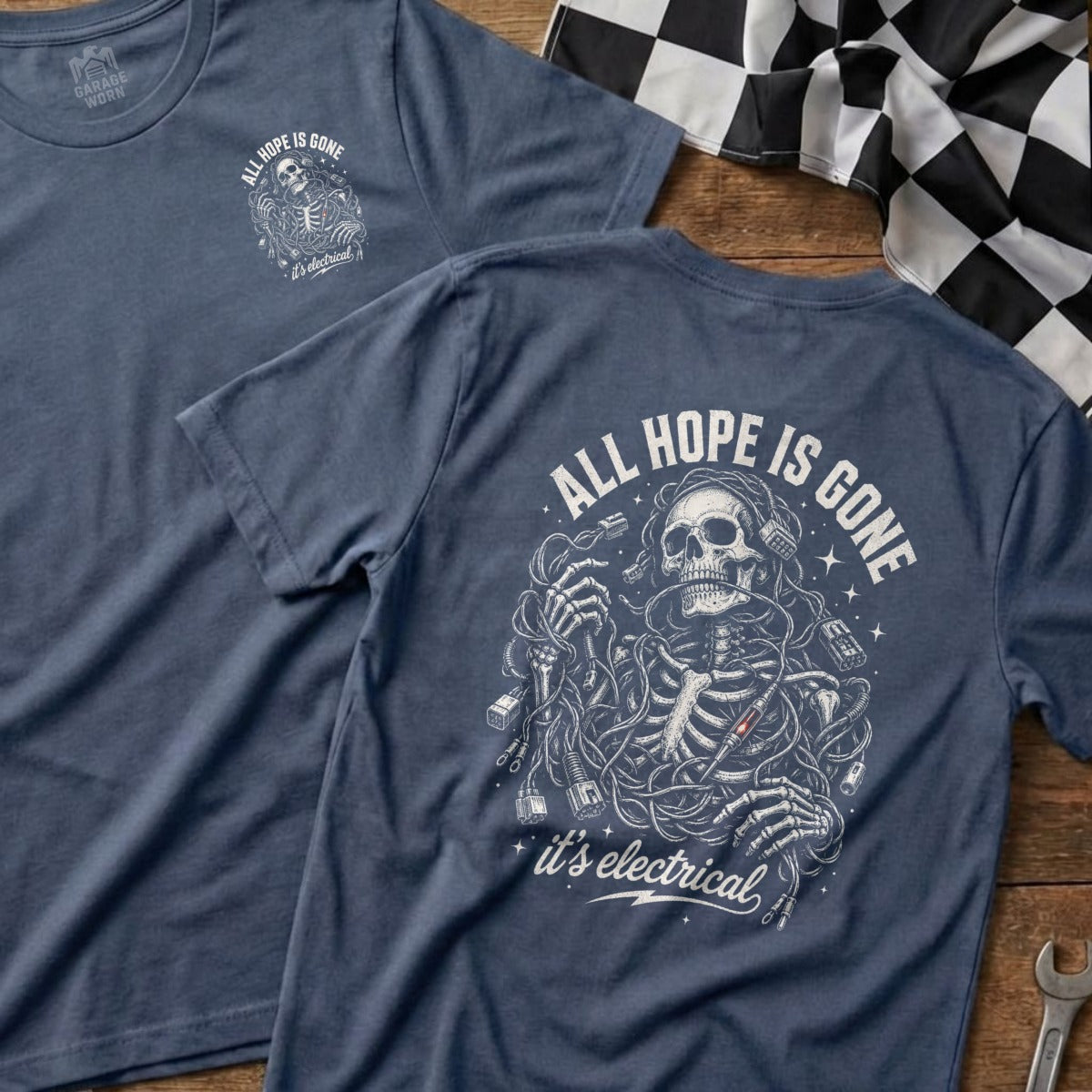 Blue t-shirt with skeleton tangled in wires and text "ALL HOPE IS GONE it's electrical".