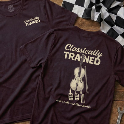 T-shirt with cello and pedals graphic and "Classically Trained" text.
