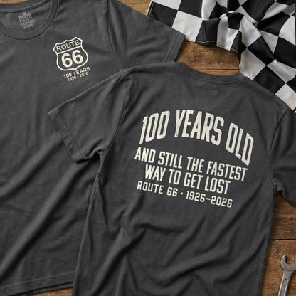 Dark gray t-shirt celebrating 100 years of Route 66 with racing flag.