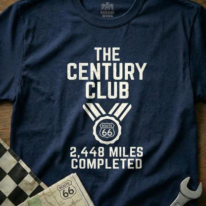 Navy t-shirt with "The Century Club 2,448 Miles Completed" text and Route 66 graphic.