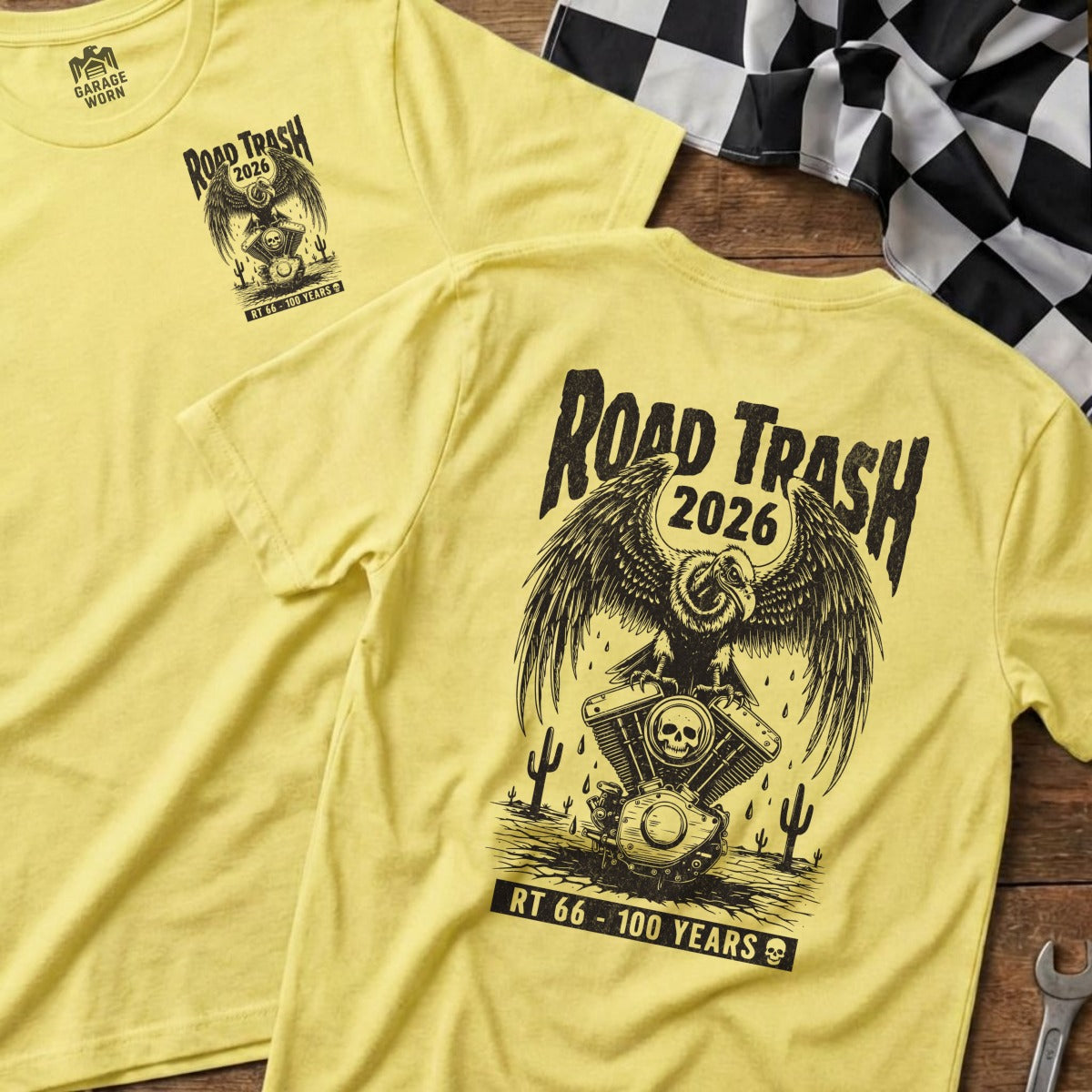 Yellow t-shirt with eagle, motorcycle engine, and "Road Trash 2026" text.
