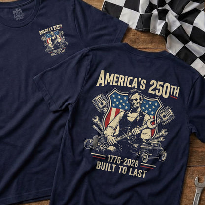 Navy t-shirt with Abraham Lincoln graphic, "America's 250th Built to Last."
