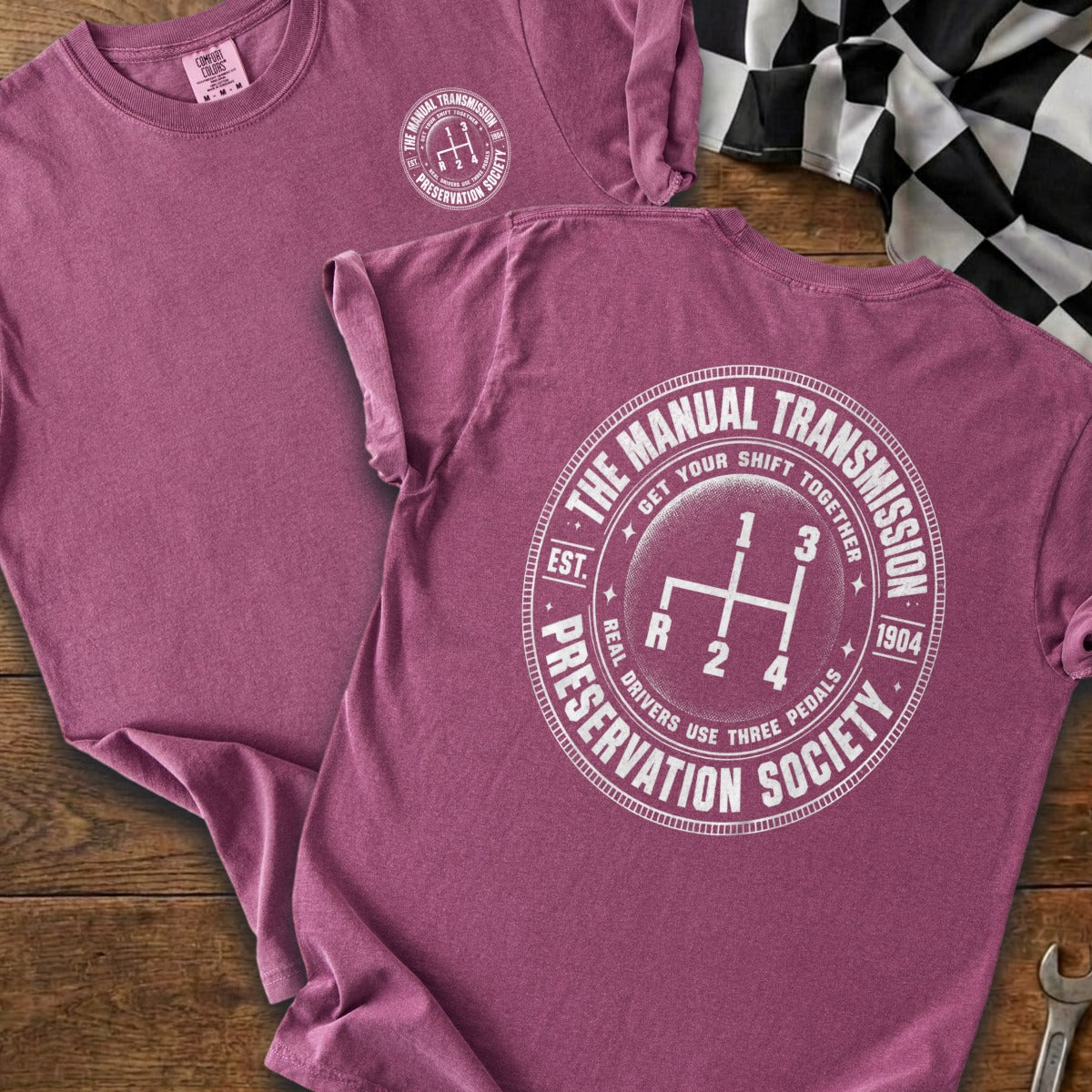 T-shirt with "The Manual Transmission Preservation Society" and gear shift graphic.