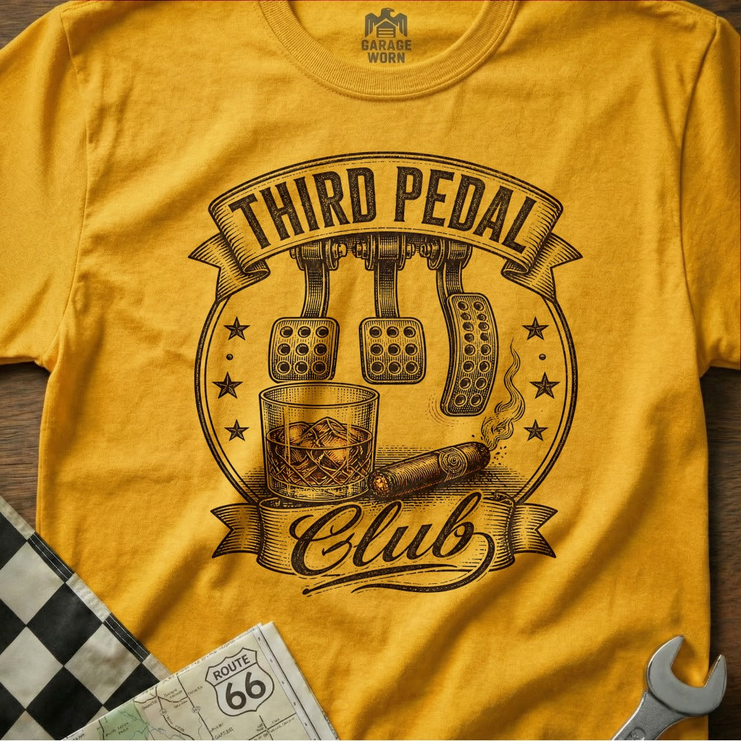 Yellow t-shirt with "Third Pedal Club" design featuring car pedals, whiskey, and a cigar.