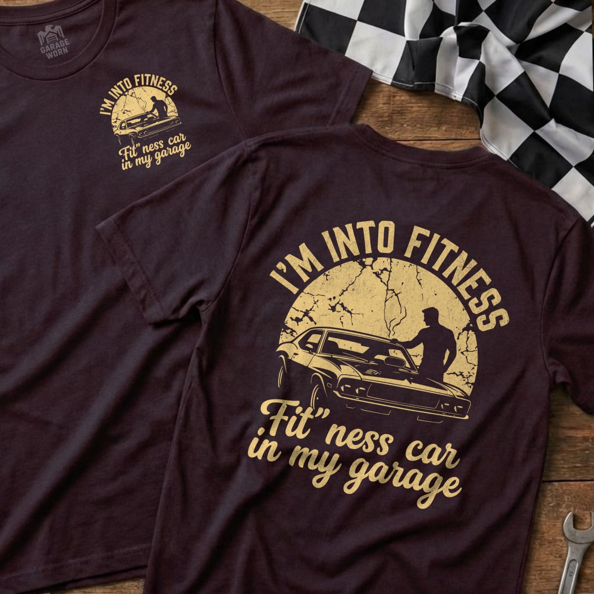 T-shirt with "I'M INTO FITNESS Fit' ness car in my garage" text and car graphic.